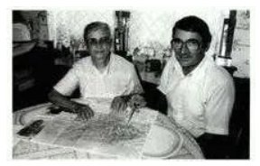 B/W picture of Moses and Sadie sitting at their kitchen table